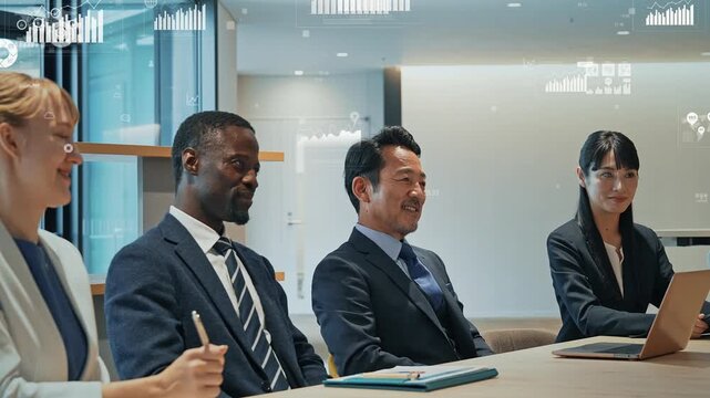 Group of multinational business people discussing business in lobby with financial technology concept.