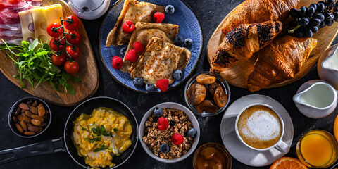 Breakfast served with coffee, eggs, cereals nd croissants
