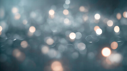 The image shows a field of lit candles, with a hazy, blue background and soft, out of focus lights.