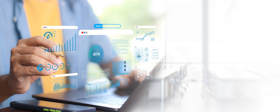 Data analyst working on business analytics dashboard with charts, with KPI and metrics connected to the database for technology finance, operations, sales, marketing