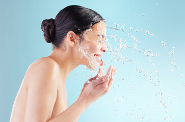 Studio, woman and profile with water splash in face for natural hygiene, skincare and morning...