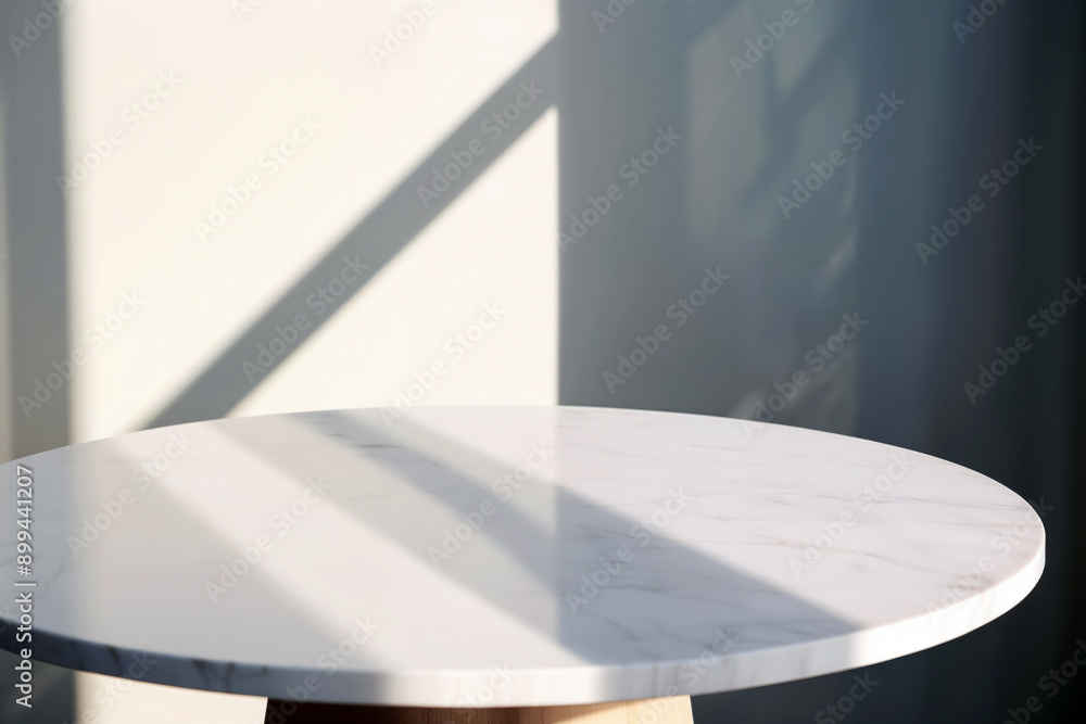 Poster Empty round white marble table top for product placement with window light shadow