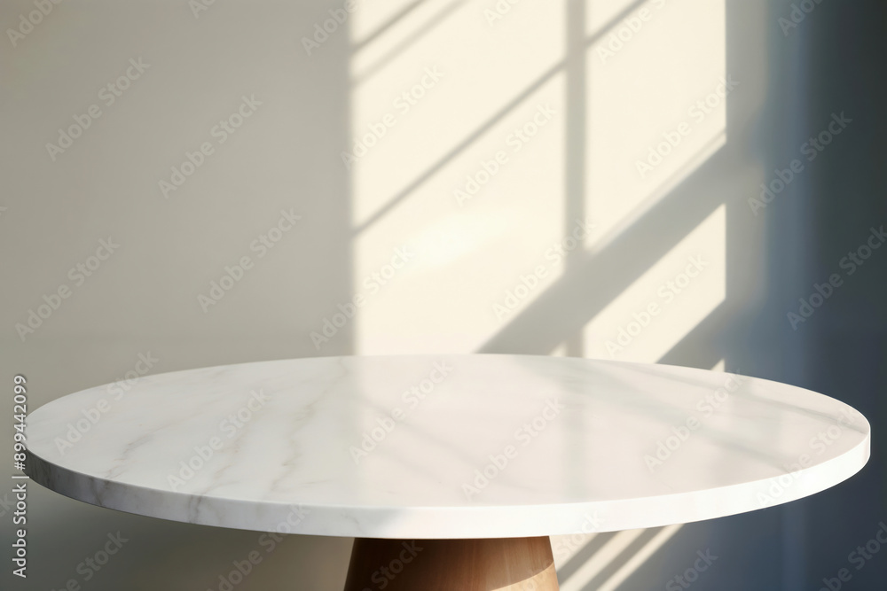 Aufkleber Empty round white marble table with shadows from window sunlight