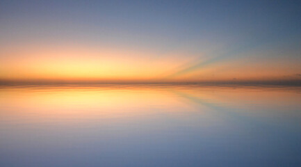 the reflection of a sunset in the Caribbean Sea