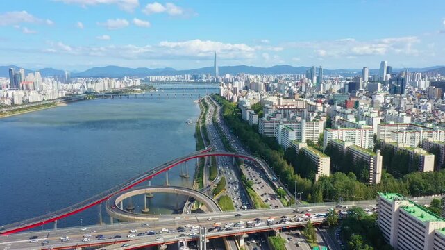 Aerial landscape of Seoul, South Korea and the bright rays of the sun Blue sky and white clouds
