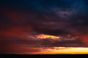 Colourful landscape of beautiful dark sunset or sunrise. Natural abstract background.