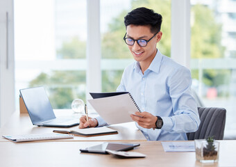 Businessman, smile and desk with book in office for stock market, investment and growth of revenue....