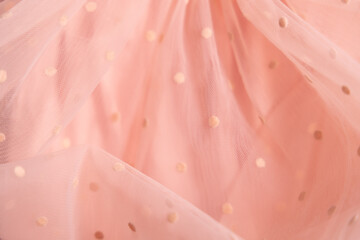 Tulle fabric texture background, textile pattern, pink polka dot on tulle, copy space