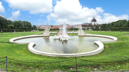 Vienna, Austria. View of the beautiful Fountain of the Falls. In the background the Lower Belvedere...