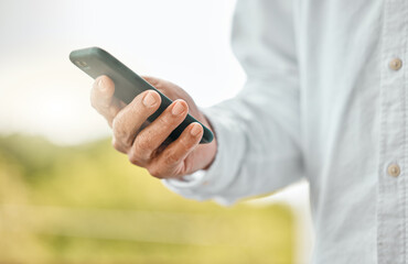 Man, phone and hand for communication in outdoor, social media surfing and online for browsing. Male person, app search and nature to relax by typing message, internet connection and website for info