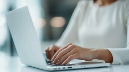 Fototapeta premium Romantic couple shopping online together at a table with a laptop. Woman holding a credit card. Love and technology concept.