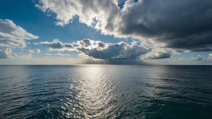 Obraz premium Calm weather on sea or ocean with clouds