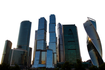 Skyscrapers of Moscow City illuminated at night against a white background. Urban landscape showcasing modern architecture and city life
