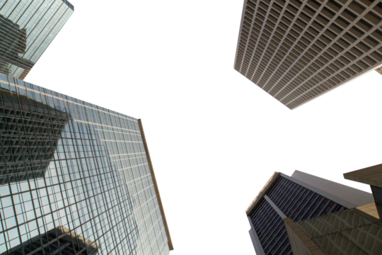Modern skyscrapers with glass and steel facades viewed from below against a white. Urban architectural design concept