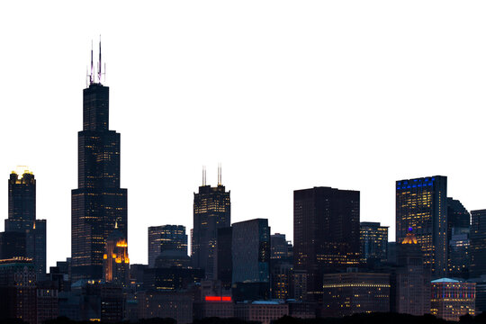 Chicago skyline at night showcasing illuminated buildings, with a white background. Concept of urban nightscape and city lights