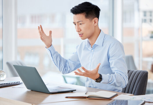 Stress, laptop and businessman in office with frustration for stock market crash online with finance loss. Crisis, mistake and Asian male financial broker upset for investment decline on computer.