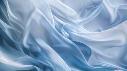 Obraz premium Elegant folds of light blue fabric create soft, flowing waves, combining simplicity with sophistication, highlighted by gentle light.