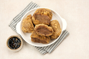 Tahu Walik, fried tofu stuffed with meatball. Indonesian food
