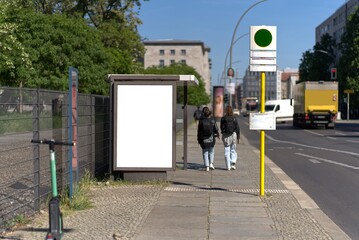 Portrait format billboard or display at a bus stop in Berlin.