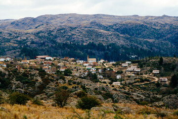 Obraz premium Panoramic view of La Cumbrecita town in Cordoba province, Argentina. Winter season tourism. German style town in the middle of mountains.