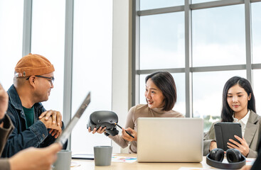 Asian business start up freelance people team analyzing statistics financial. Group Team of businesspeople man and woman Meeting Conference Discussion various topic Corporate Concept in office.