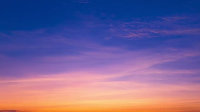 Serene gradient sky transition at sunset over tranquil horizon