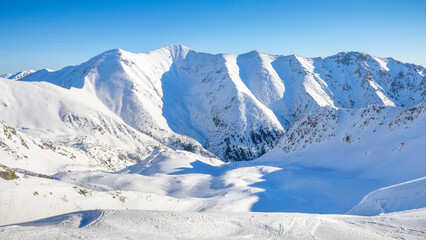 snow covered mountains in winter