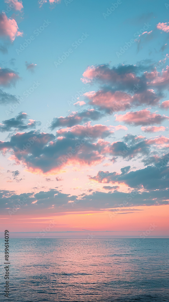 Wall mural Serene Sunrise Sky with Pastel Colors and Gentle Clouds  