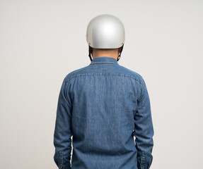 Young rider man wearing safety helmet before riding the motorcycle. Safety ride.