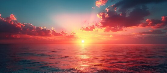 Fototapeta premium Sunset Over the Ocean with Dramatic Sky