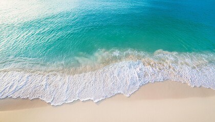 Beautiful tropical summer beach, top view of white sand and blue sea waves, nature background, vacation in paradise concept for tourism, vivid colorful.