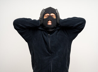 Thief in uniform black jacket various pose on isolated background. The Robber terrorism criminal...