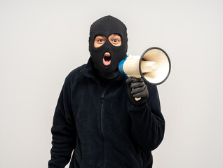 Thief in uniform black jacket various pose on isolated background. The Robber terrorism criminal...
