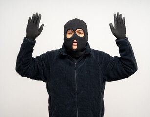 Thief in uniform black jacket various pose on isolated background. The Robber terrorism criminal...
