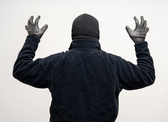 Thief in uniform black jacket various pose on isolated background. The Robber terrorism criminal...