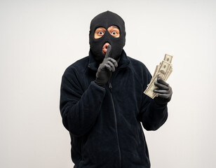 Thief in uniform black jacket various pose on isolated background. The Robber terrorism criminal...