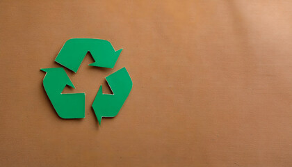 Recycling logo on cardboard as a symbol of environmental awareness, reuse and recycling.