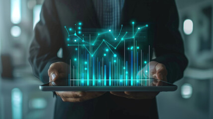 Business Professional Analyzing Data and Trends Using a Tablet in a Modern Office Environment