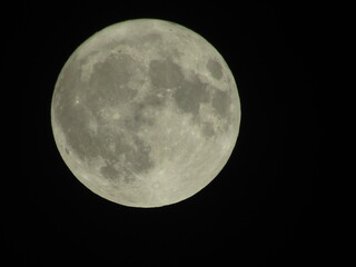 full moon over black