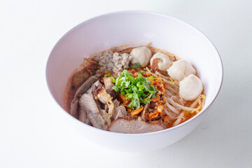 Tom Yum Noodles with Grilled Pork Thai style noodles, spicy flavor, isolate and white background