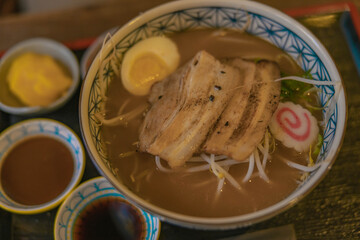 a bowl of warm tonkatsu pork ramen