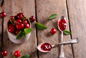 natural organic cherry jam and fresh berries