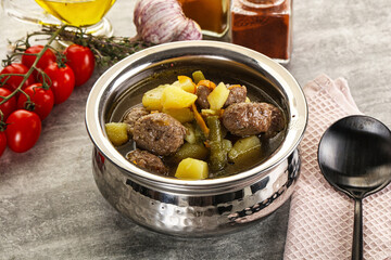 Soup with meatball and potato