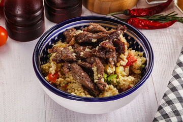 Traditional couscous with beef and vegetables
