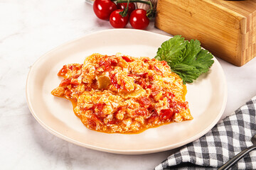 Shakshuka with tomato for breakfast
