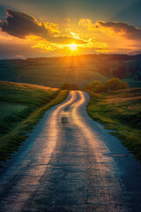 A serene dirt road winds through tranquil countryside hills under a vibrant sunset sky, creating a picturesque and peaceful landscape scene.