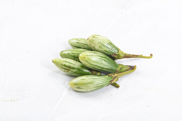 Small organic young green eggplant
