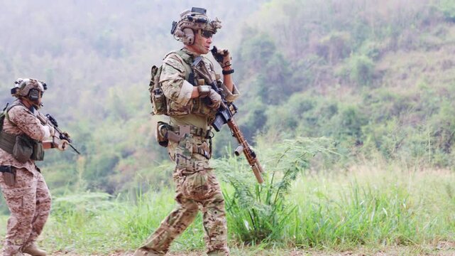 Special forces Unit soldiers gather for war duty, Soldiers in camouflage carrying weapons, reconnaissance missions in a dangerous reconnaissance mission.