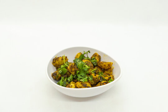 A Bowl of Spicy Potato Achaar Potato Salad with Coriander aka Aalu ko Achaar, Spocy Potato Pickle