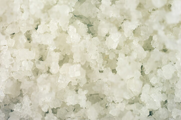 Detail of white coarse salt pile of salt flats